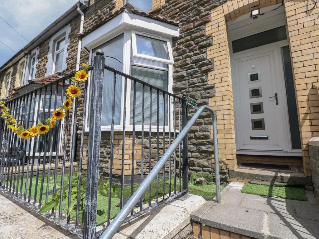 a wrought iron fence in front of a house at 5 Gelli Terrace in Caerphilly