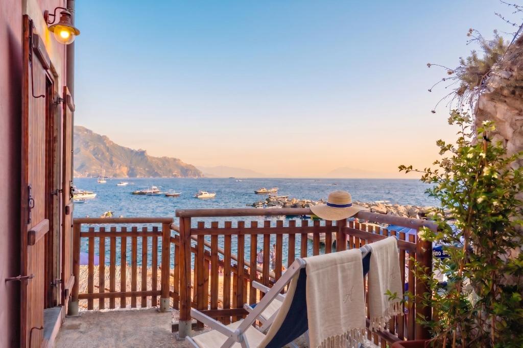 a balcony with a view of the ocean at Casa della Marina - beach, seaview, wifi in Conca dei Marini