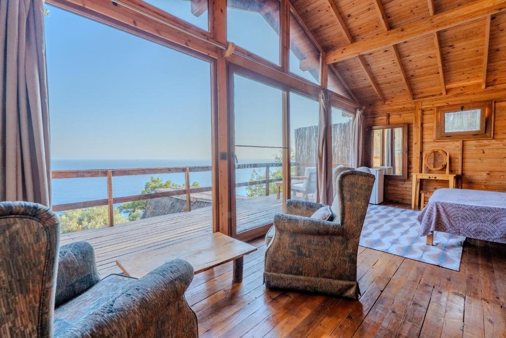 a living room with a view of the ocean at 11-11Shambala in Fethiye