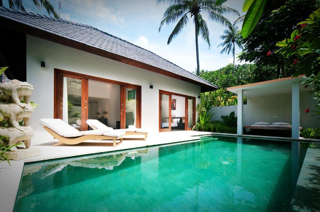 La pileta dentro o cerca de Kebun Villas & Resort