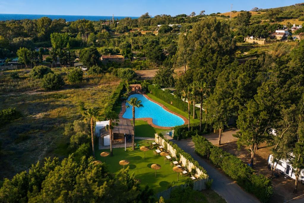 an aerial view of a resort with a swimming pool at Kampaoh Paloma in Tarifa