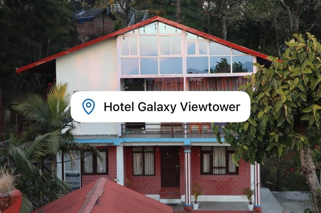 a house with a sign that reads hotel galleryviewpayer at Hotel Galaxy View Tower in Nagarkot