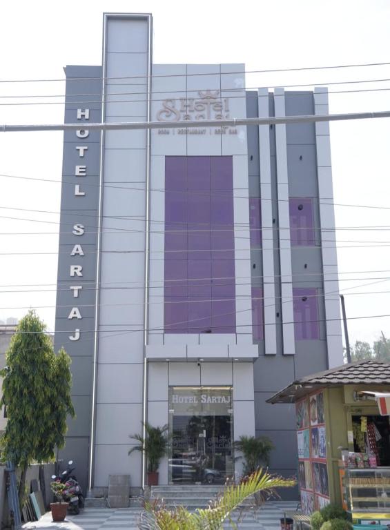 a building with the name of a store at Hotel Sartaj in Dera Bassi