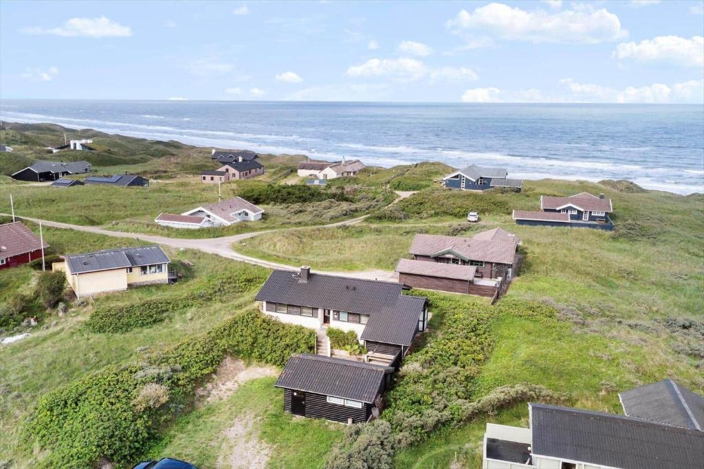 an aerial view of a house near the ocean at LN1963-Hirtshals-Klynen-19 in Hirtshals