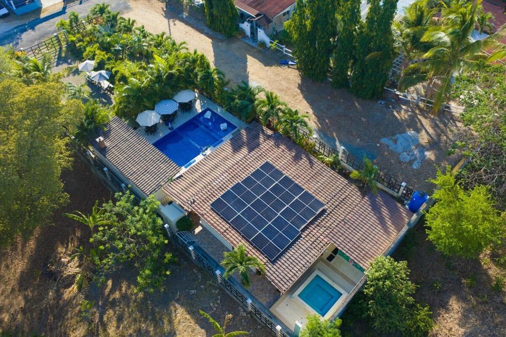 an overhead view of a house with a swimming pool at Majestic Sands in San Carlos