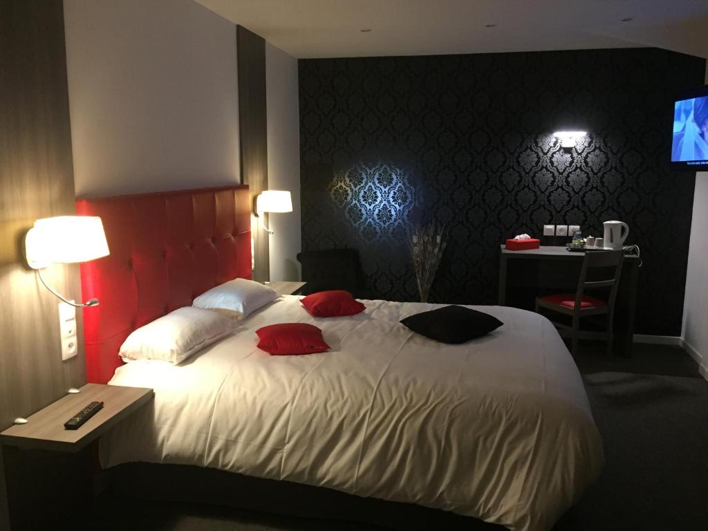 Postel nebo postele na pokoji v ubytování Le Beverl'inn