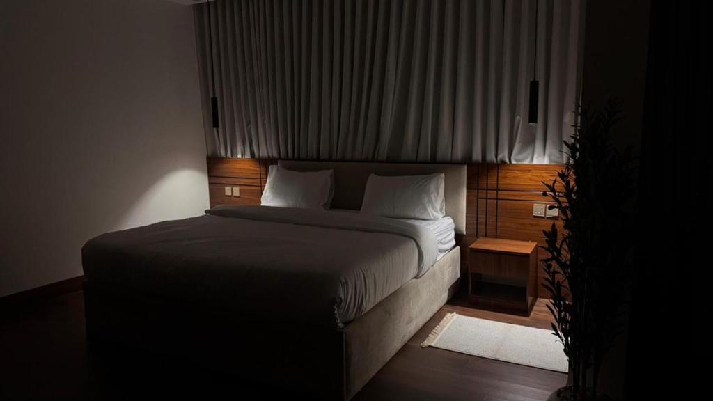 a bedroom with a large bed in a room at STAYs ستايز in Medina