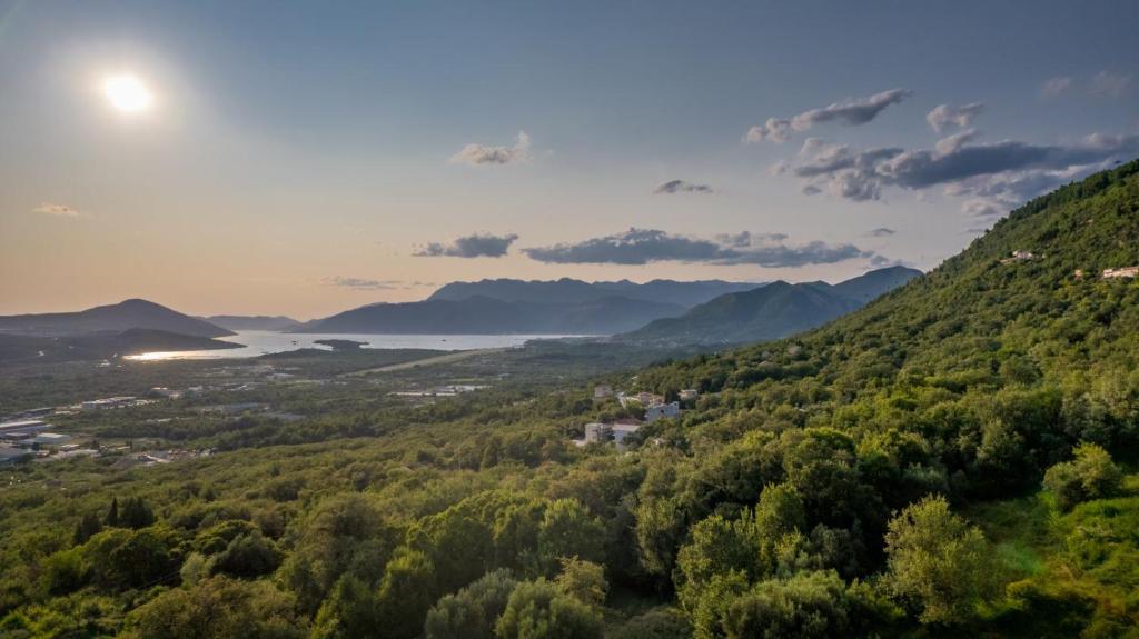 a view of a valley with a lake and mountains at Apartment Brijest-Kotor in Kotor