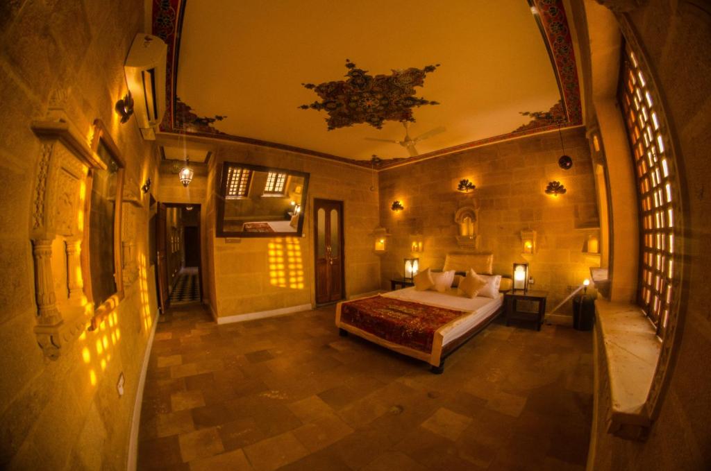 Säng eller sängar i ett rum på Fort Villa