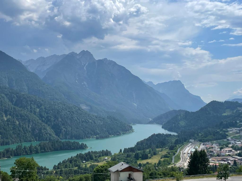 a view of a lake in a valley with mountains at Casa Cadore Grea in Grea