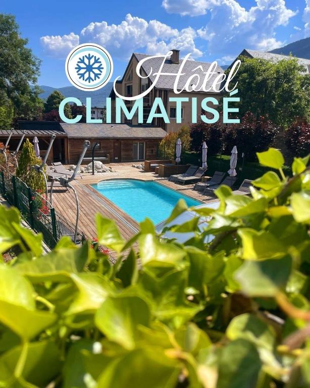 a sign for a hotel with a swimming pool at Hôtel Neste de Jade in Saint-Lary-Soulan