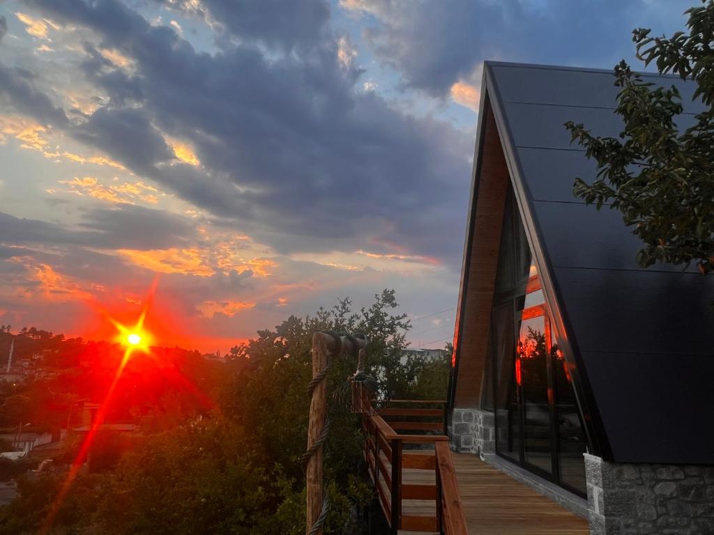 a house with a view of the sunset at Rozafa Sunset in Shkodër