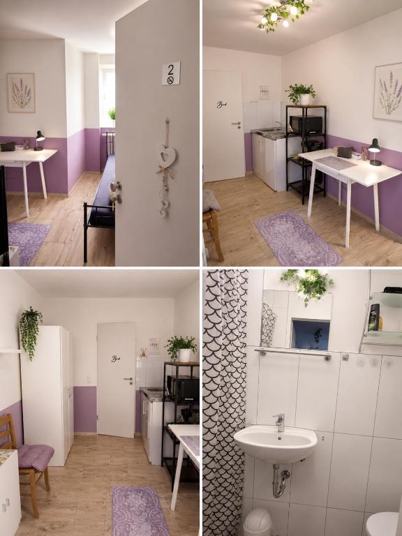 a room with a sink and a bathroom with purple walls at Fremdenzimmer Sas in Hückelhoven