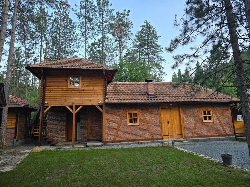 a wooden cabin in the middle of a forest at Forest soul "Jaslice" - Ozren in Doboj