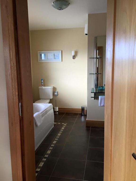 Postel nebo postele na pokoji v ubytování Red Gate House B&B