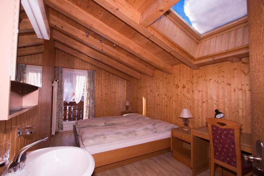 Postel nebo postele na pokoji v ubytování Monte Rosa