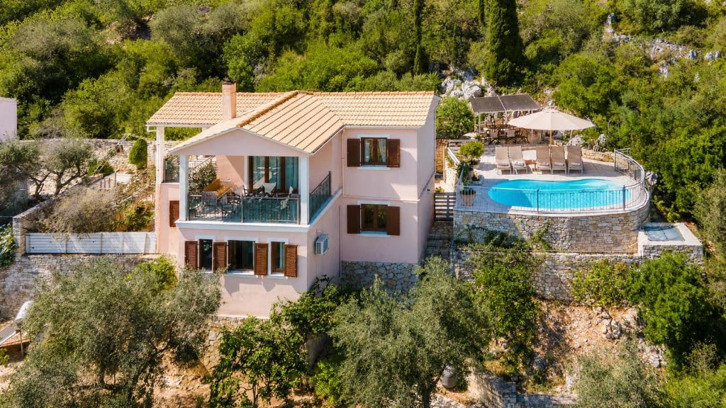 an aerial view of a villa with a swimming pool at Villa Elpida in Gaios