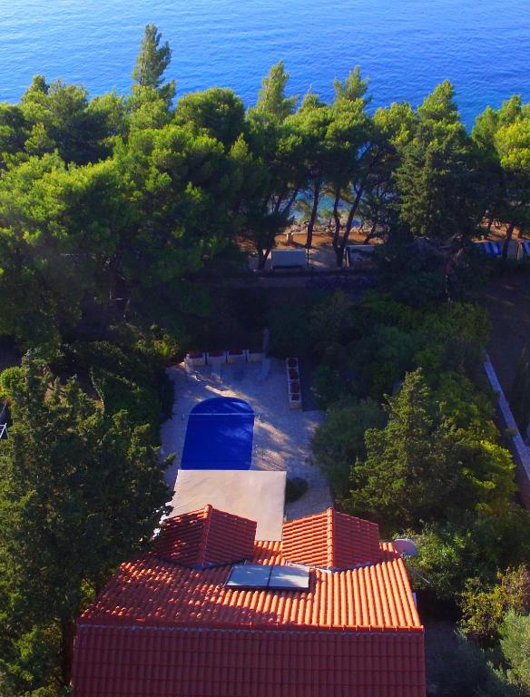 an aerial view of a house and the ocean at Villa Tamara in Bol