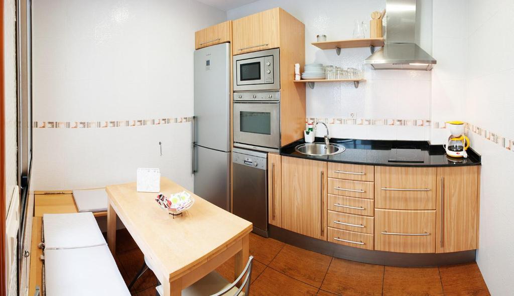 Kuchyň nebo kuchyňský kout v ubytování Apartamento Hierro 21-2
