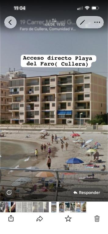 a picture of a beach with people on it at Isla de los Pensamientos in Cullera