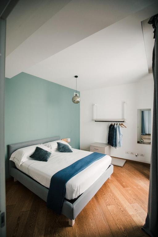 a bedroom with a large bed in a room at U Genova in Genoa