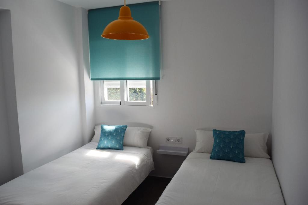 Posteľ alebo postele v izbe v ubytovaní Apartamento Flamingo Beach