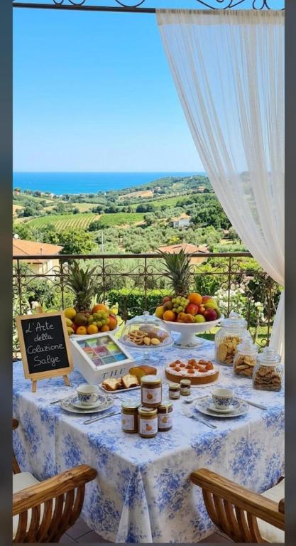 a table with a buffet of food on top at Residenza B&B Salge Colonnella in Colonnella