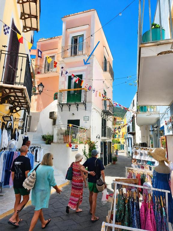 a group of people walking down a street at Maridea - Il Balcone sulla Storia in Ponza