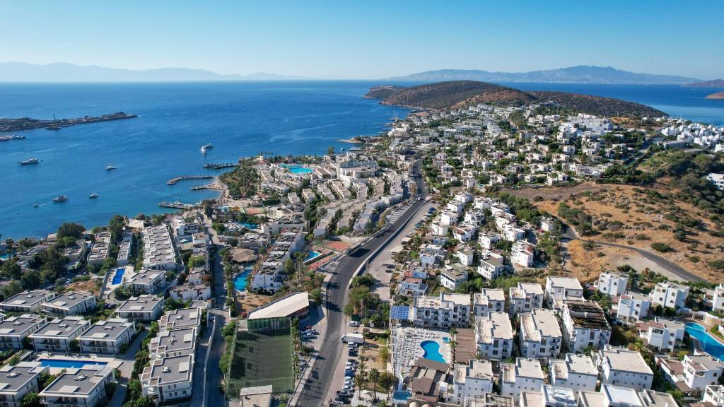 an aerial view of a city next to the water at Bodrum Fora Holiday Resort in Bodrum City