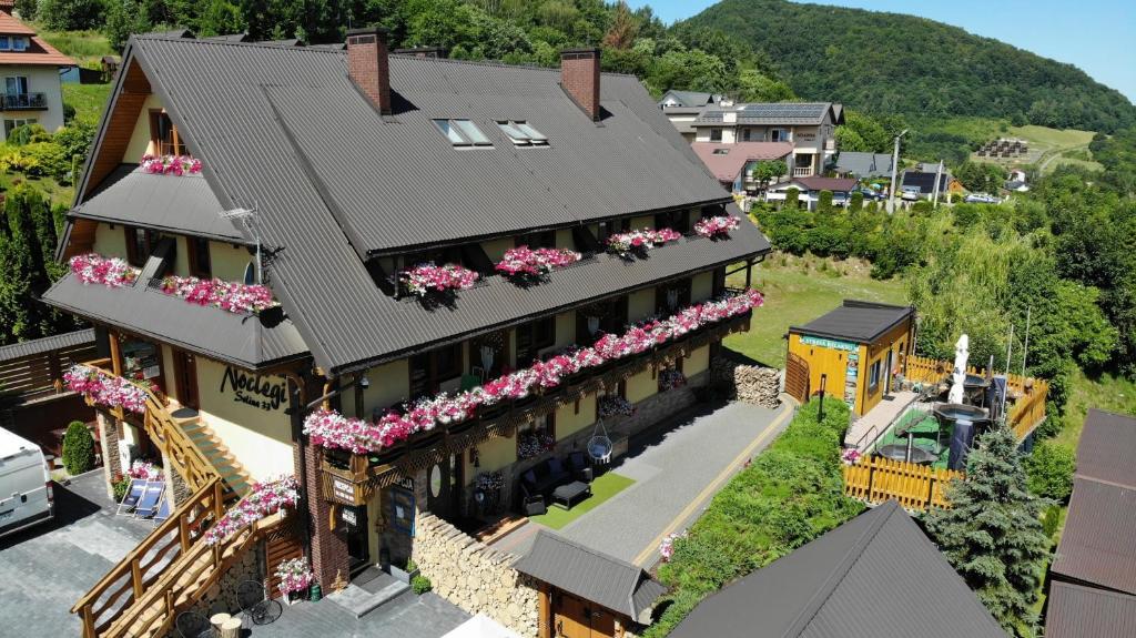 a model of a house with a train at Zielone Wzgórza - Centrum Soliny - SPA 695-744-679 in Solina