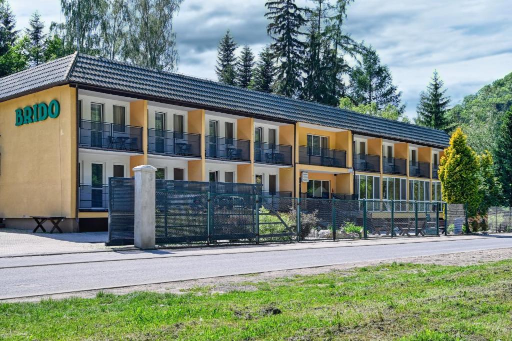 a building with a fence in front of it at Brido in Bardo