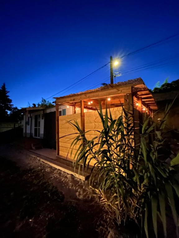 a house with a light on the roof at night at Le cocon & spa in Camaret-sur-Aigues