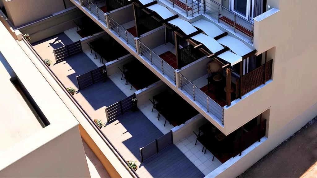 an overhead view of a balcony of a building at NikolaosMare in Nea Potidaea