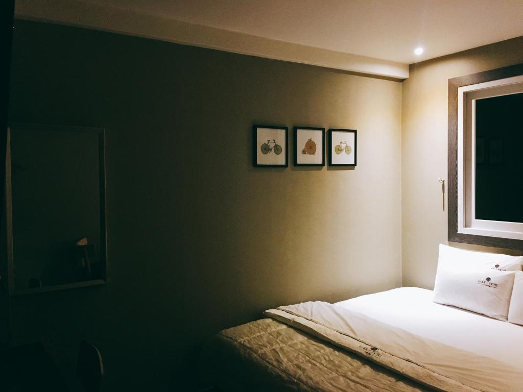 Postel nebo postele na pokoji v ubytování IDEA Hotel