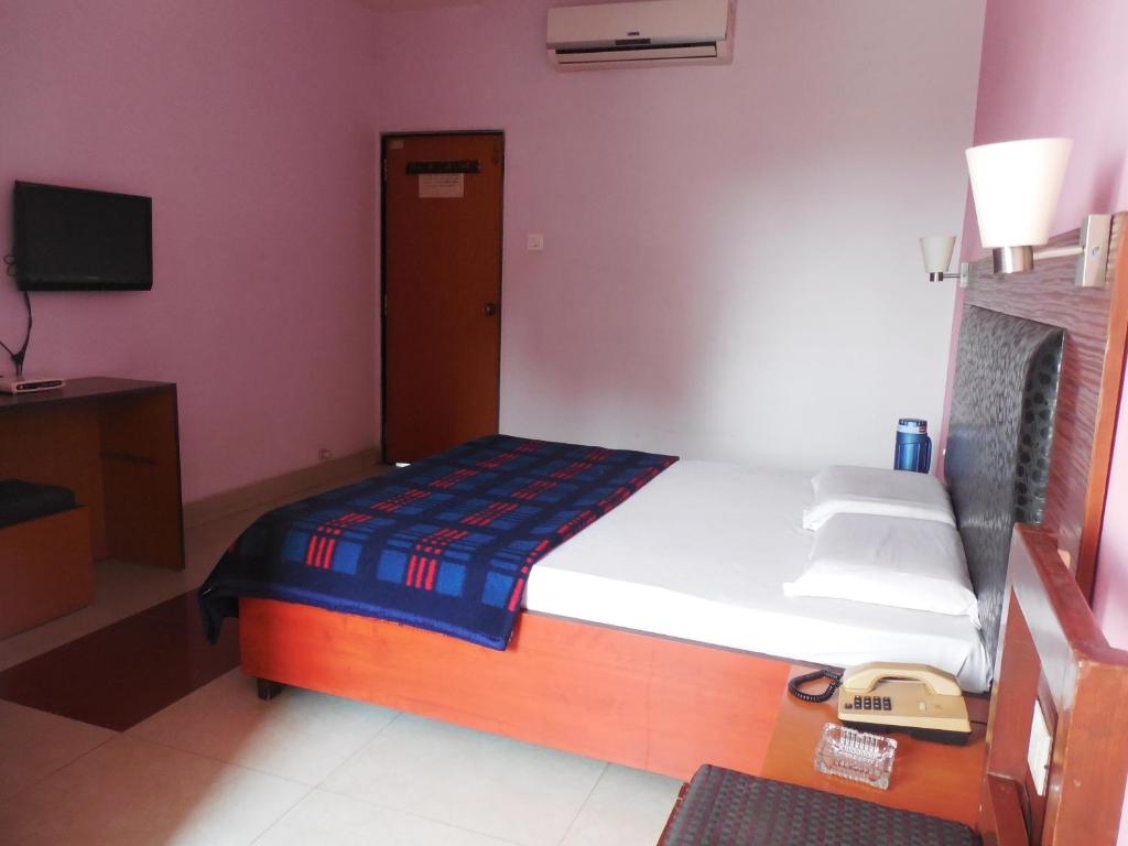 Postel nebo postele na pokoji v ubytování Hotel Silver Springs