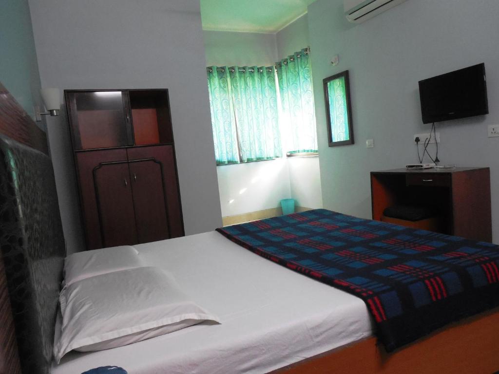 Postel nebo postele na pokoji v ubytování Hotel Silver Springs