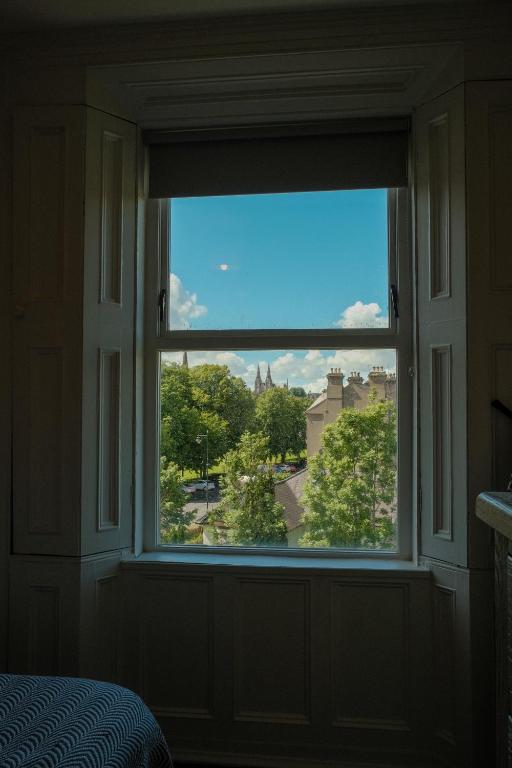a window in a room with a view of a city at Flat 4, 2 Victoria Street in Armagh