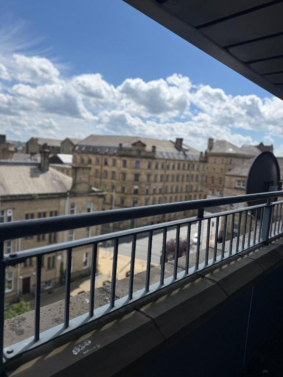 a view of a city from a balcony at Elysium pro in Bradford