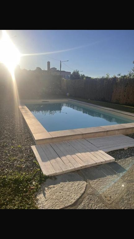 a pool of water on the side of a road at La Casa di Manu in Lessona