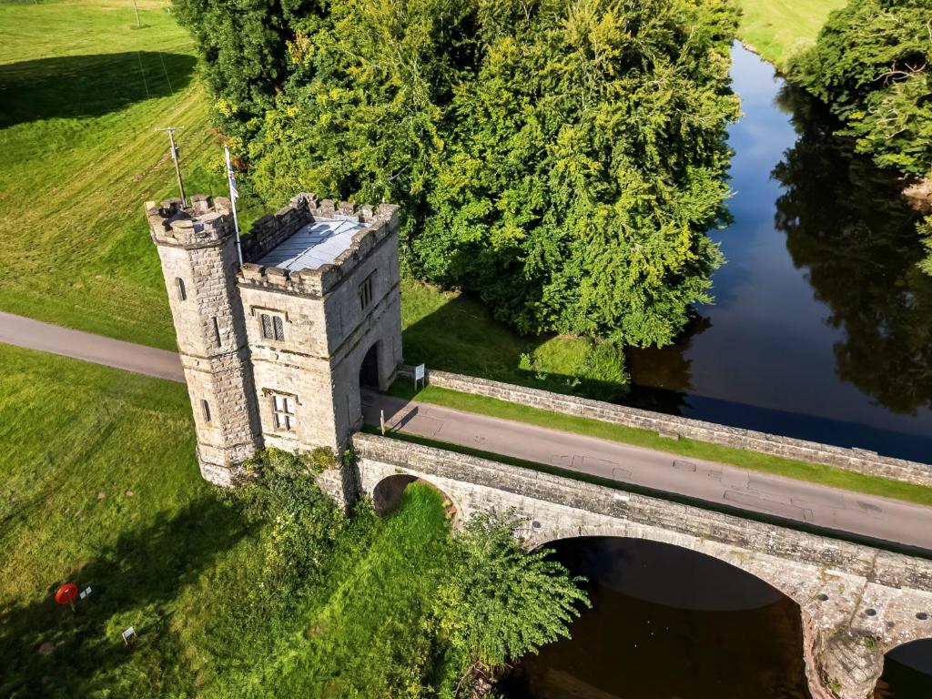 an aerial view of a castle with a bridge at The Tower - Uk46652 in Crickhowell