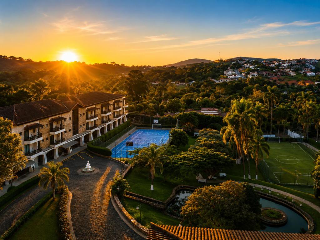 an aerial view of the resort at sunset at Flat Serra negra prox ao Centro lazer completo in Serra Negra