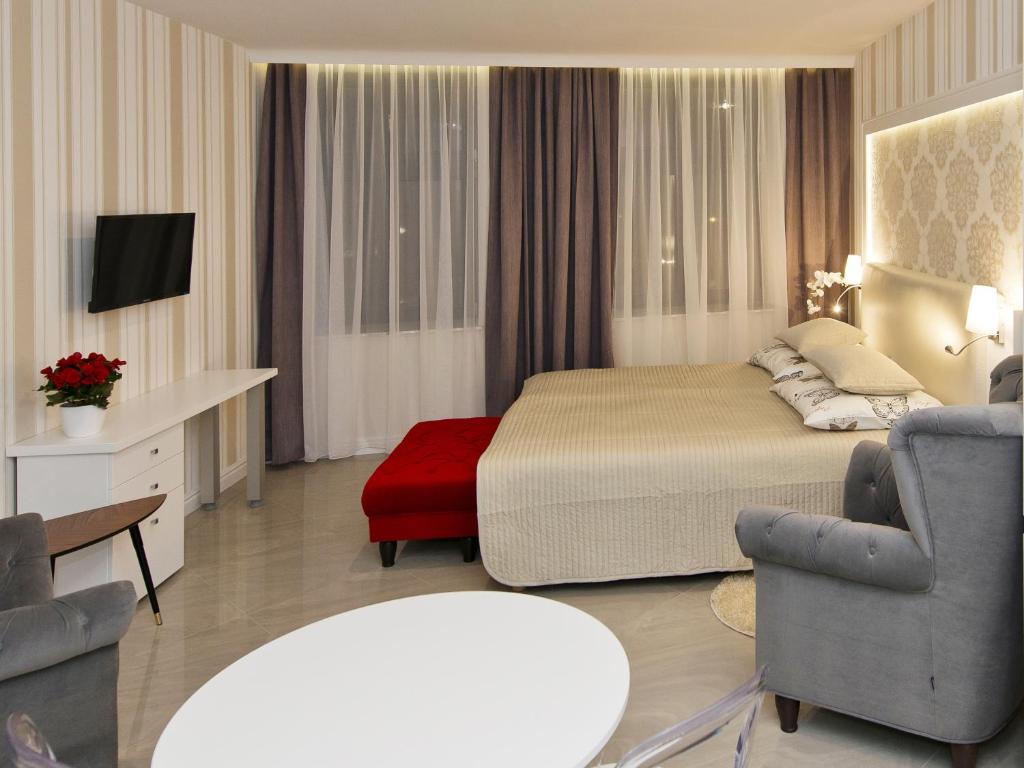 Posteľ alebo postele v izbe v ubytovaní Softly Residence