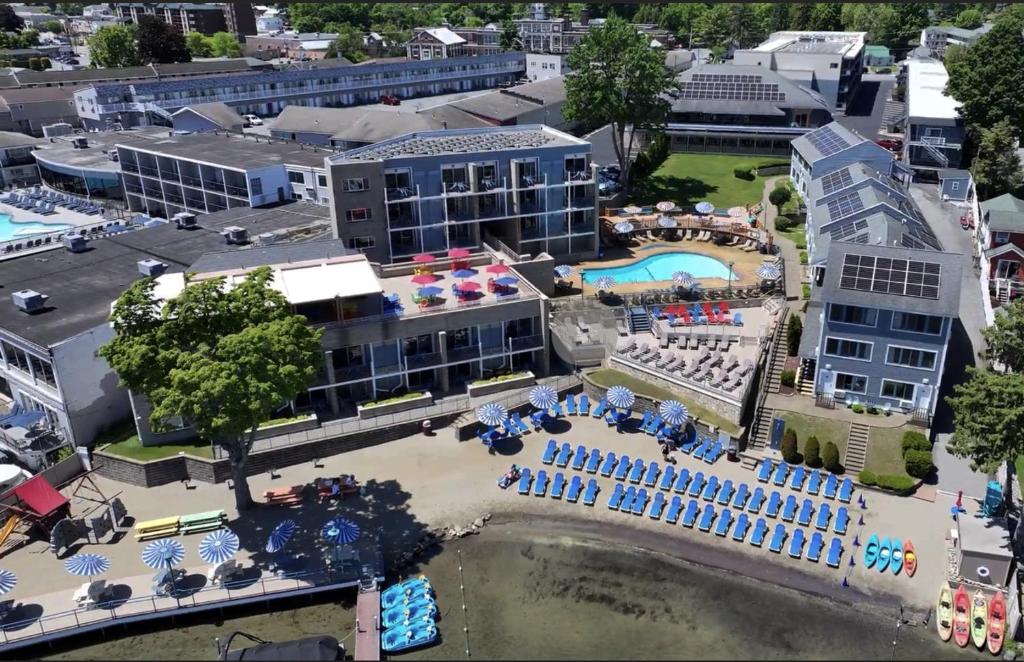 an aerial view of a resort with a pool at Surfside On The Lake in Lake George