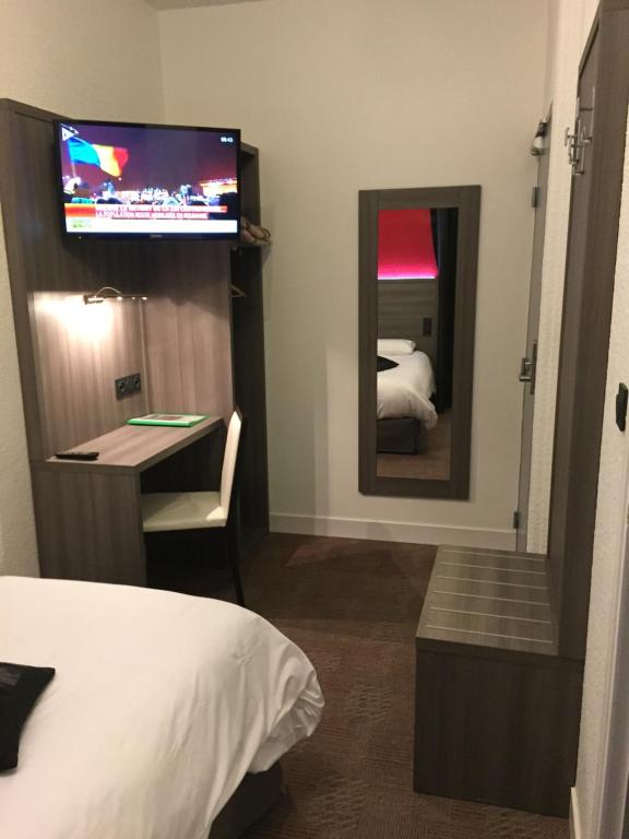 Postel nebo postele na pokoji v ubytování Le Beverl'inn