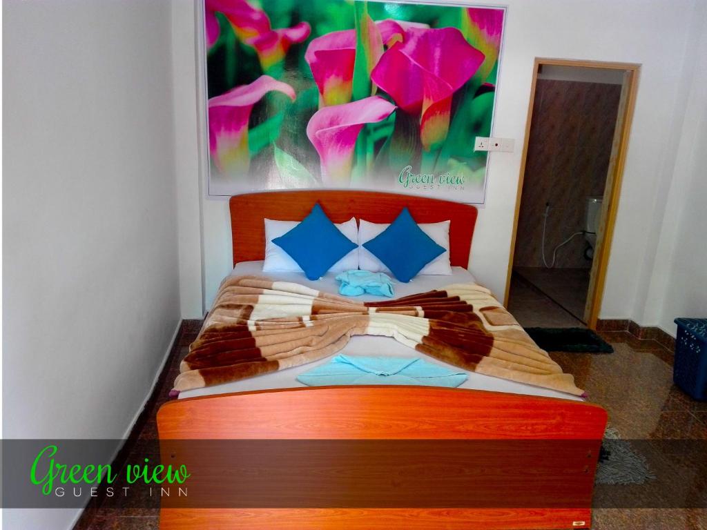 Postel nebo postele na pokoji v ubytování Green View Guest Inn