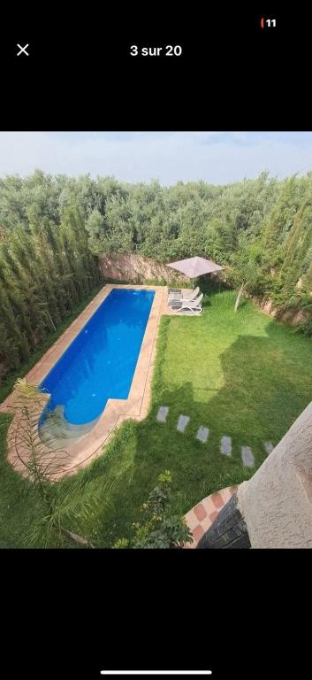 an aerial view of a swimming pool in a yard at Villa Nono & Zac Marrakech in Ourika