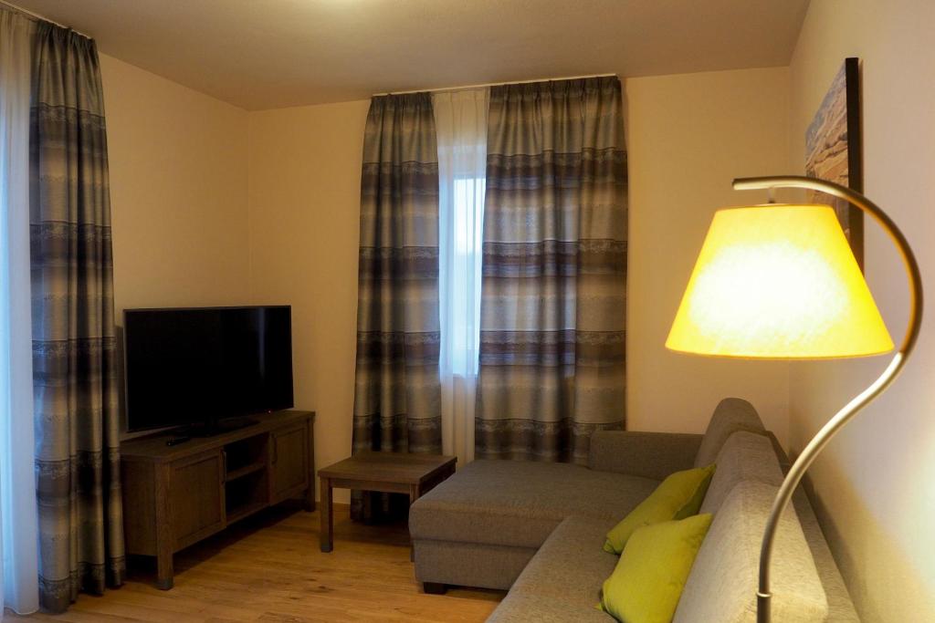 TV a/nebo společenská místnost v ubytování Mattone Aparthotel