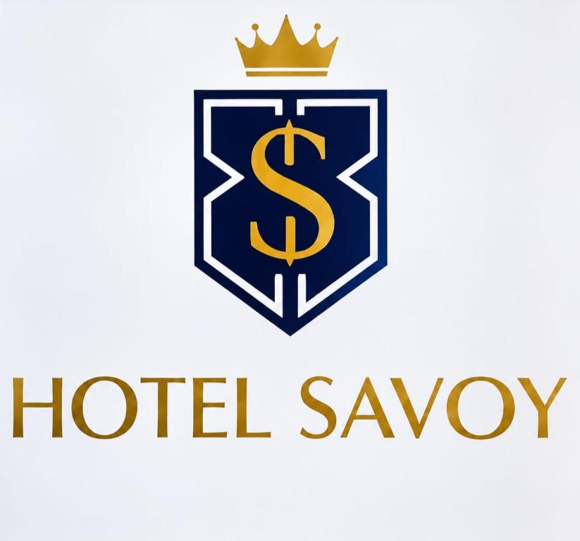 a crest with a dollar sign in a shield at Hotel Savoy in La Paz