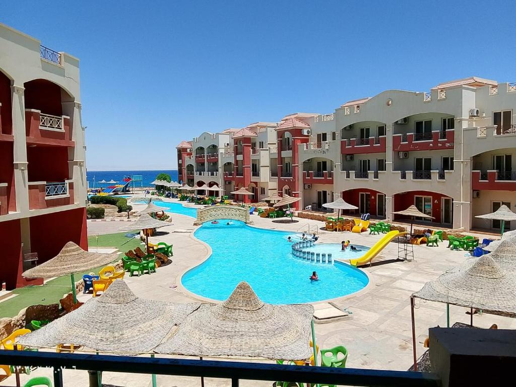 a view of a swimming pool at a resort at La Sirena Hotel & Resort - Families only in Ain Sokhna