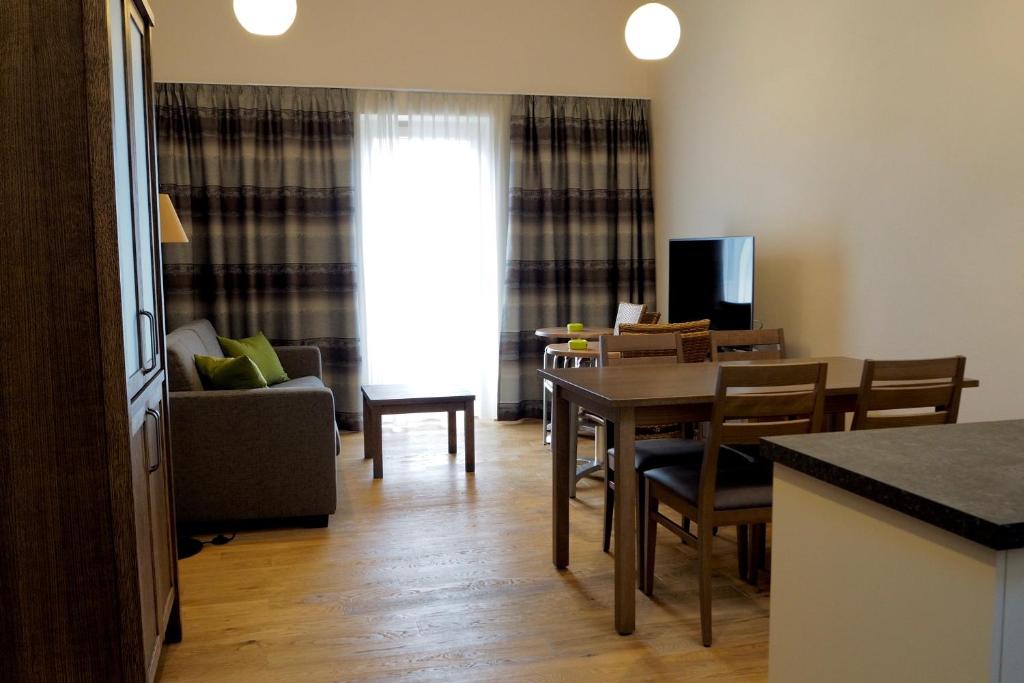 TV a/nebo společenská místnost v ubytování Mattone Aparthotel